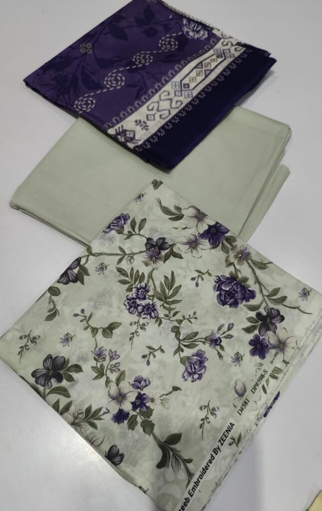 Zeenia Lawn Collection – 3 Piece Unstitched Printed Lawn Suit with Lawn Dupatta & Trouser